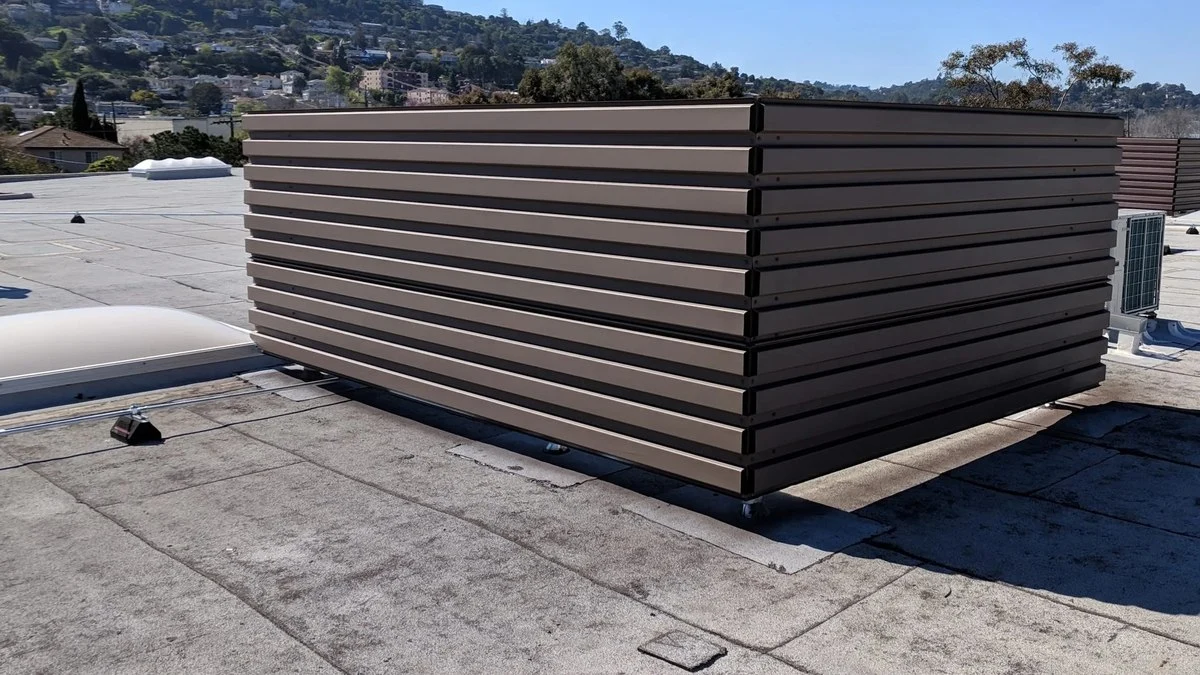 Commercial rooftop equipment screen used when evaluating screen cost factors